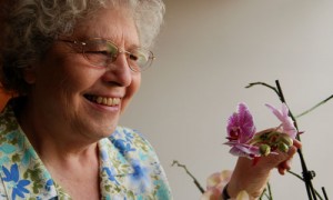 Resident and her orchid