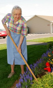 Resident Mary works the soil